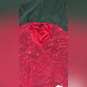 Sparkly red dress! 20w fits like a 2x possibly 3x. Very flattering to body